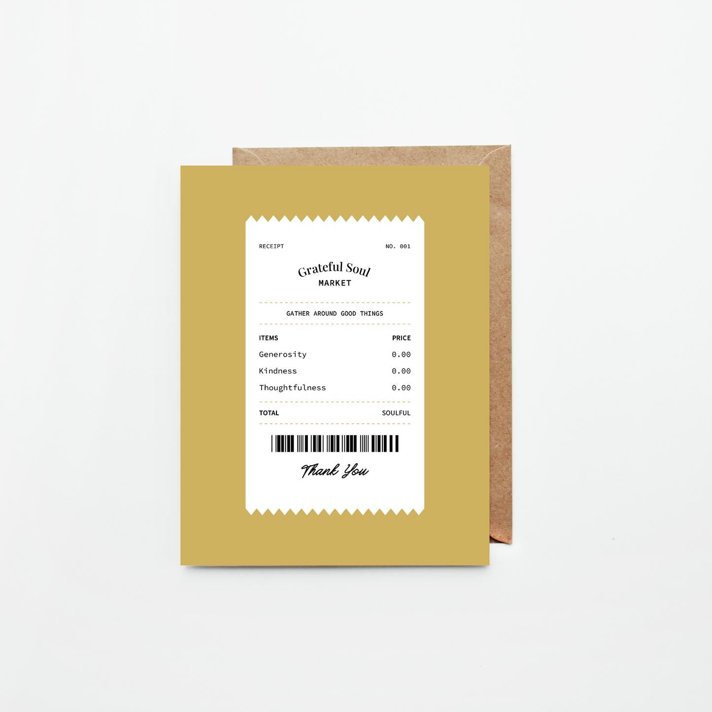 A mustard yellow greeting card with a white receipt-style design and black text, shown in front of a brown kraft envelope on a light gray background.